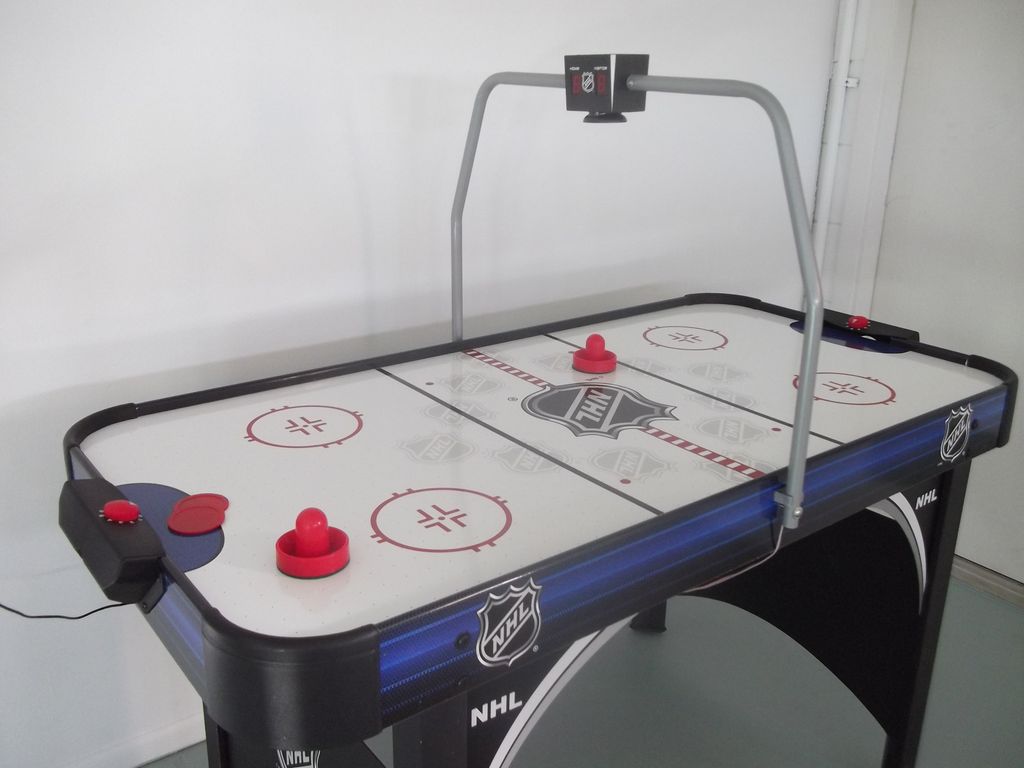 Air-hockey in gameroom